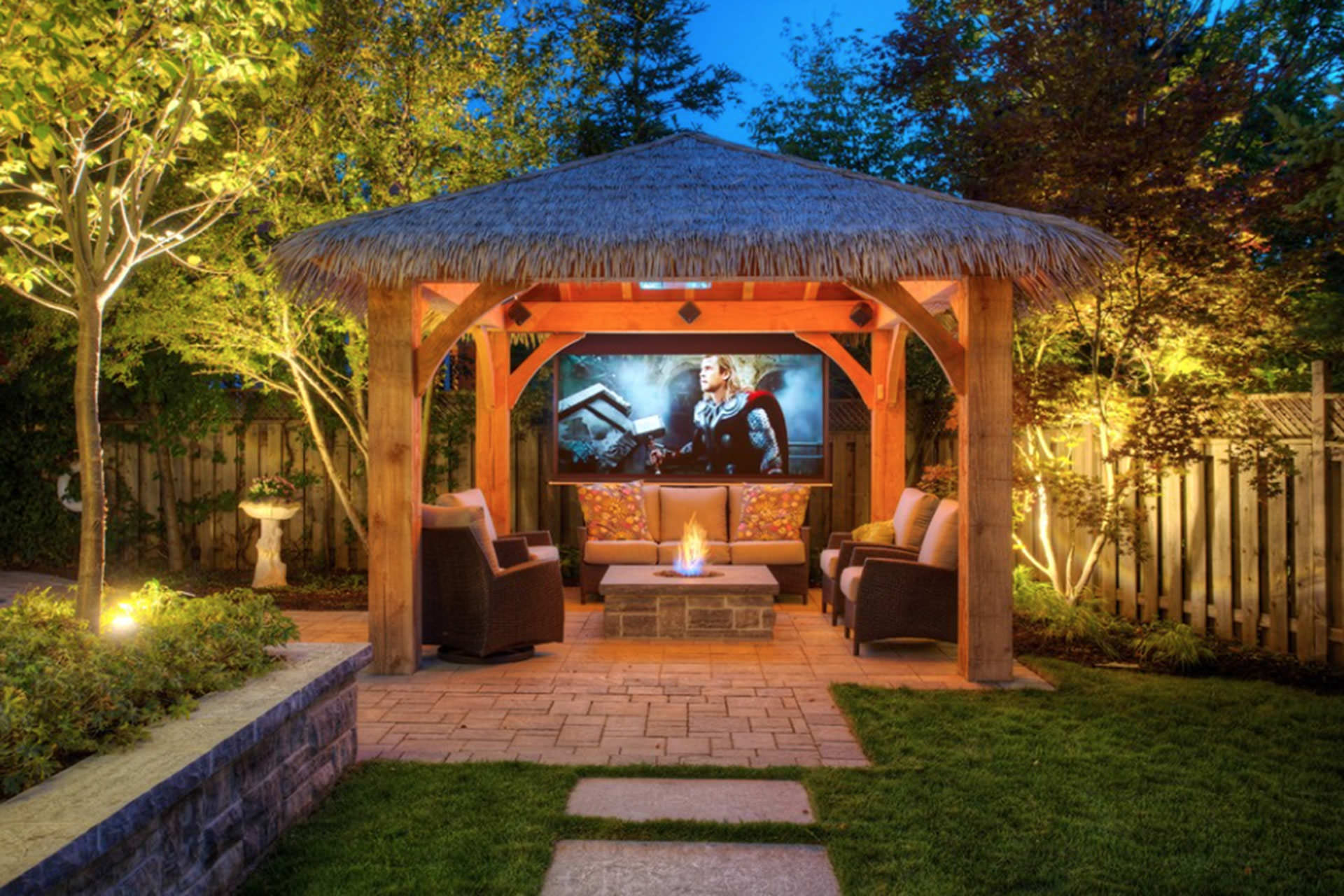 Outdoor Structure with Weather Proof Television, Seating Area and Fireplace 